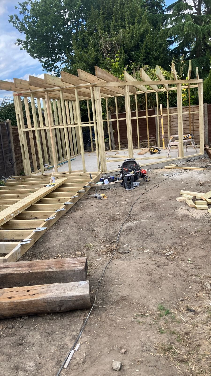 A timber frame up with rafters on