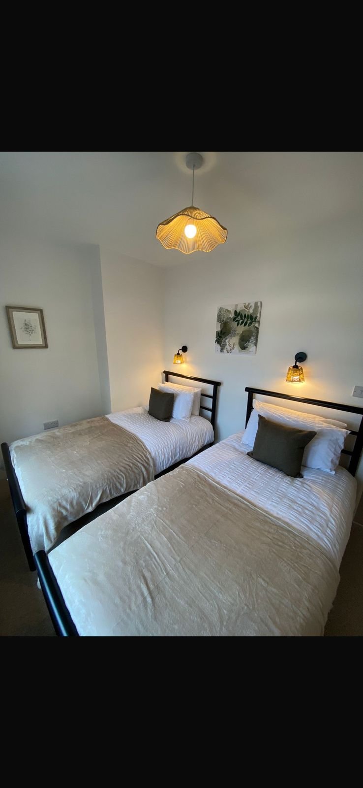 A twin room with two single beds