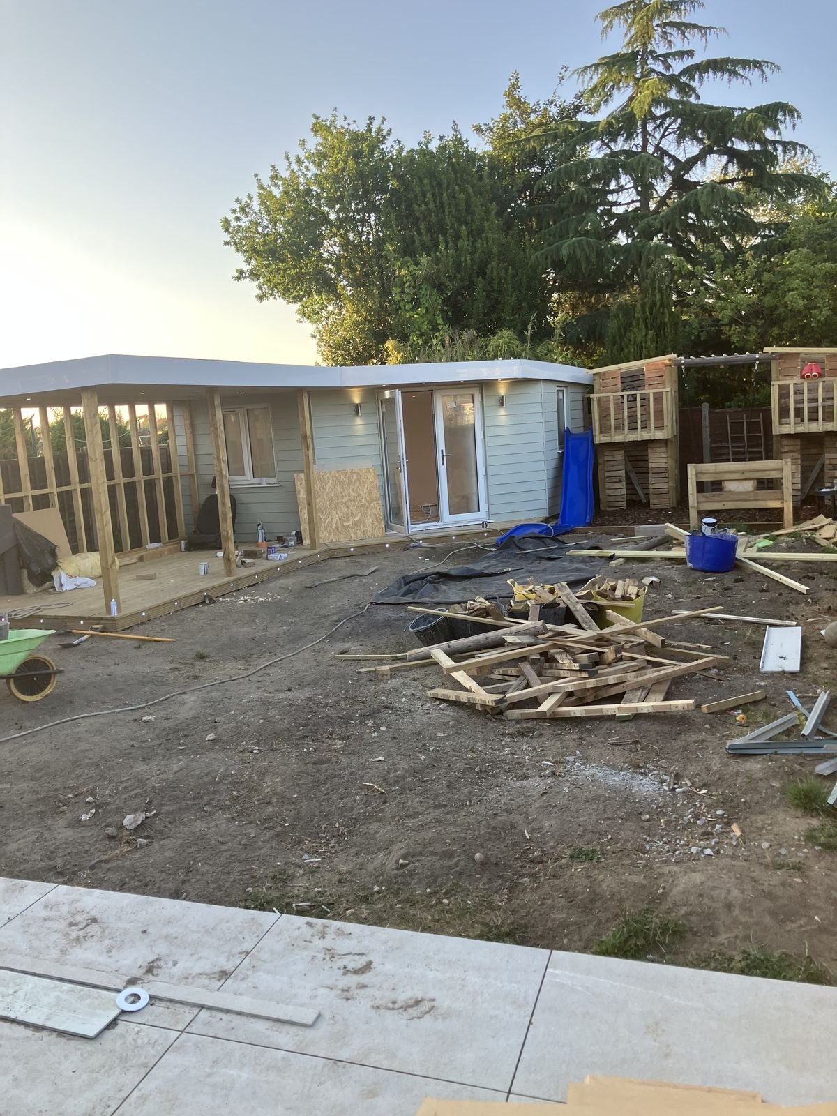 An L-shaped garden room part way through