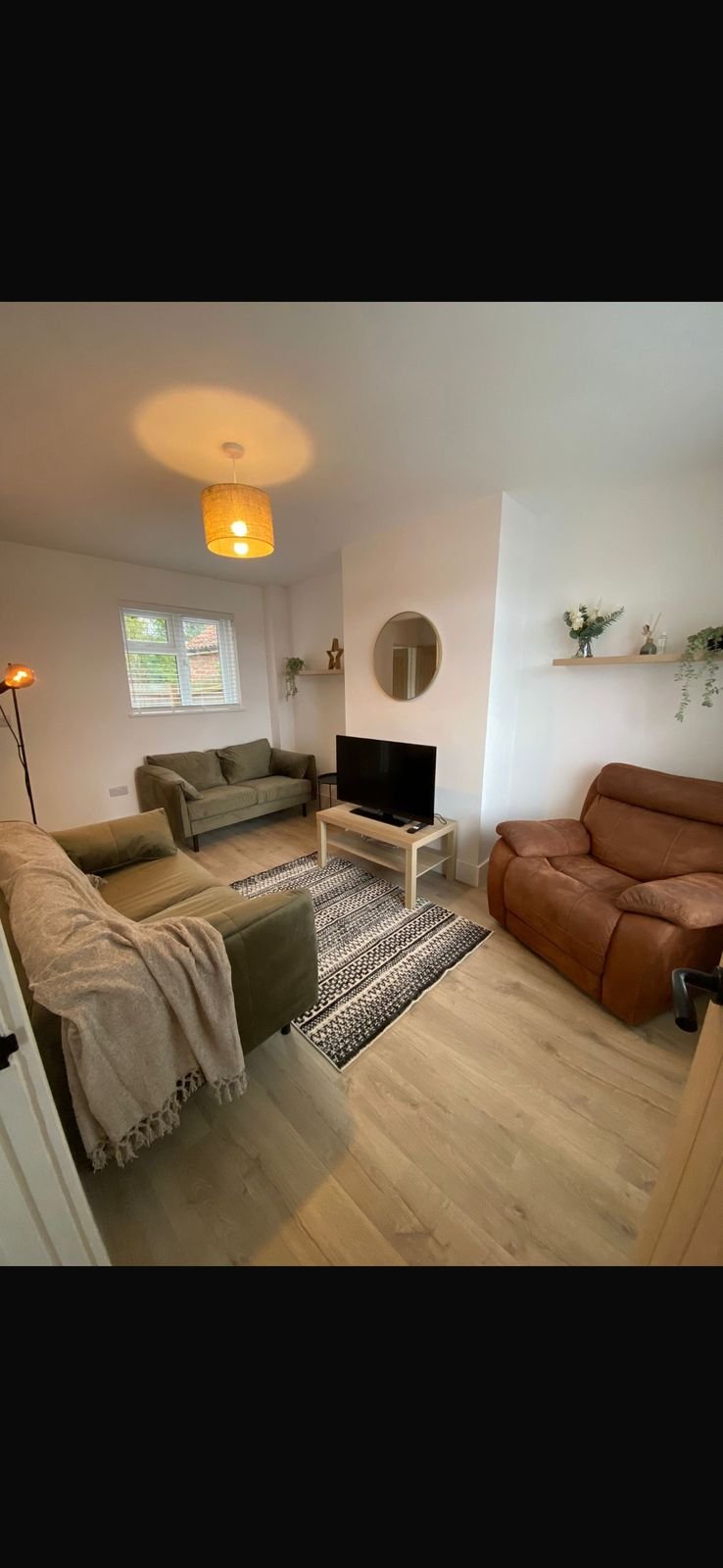 A furnished living room in a rental property
