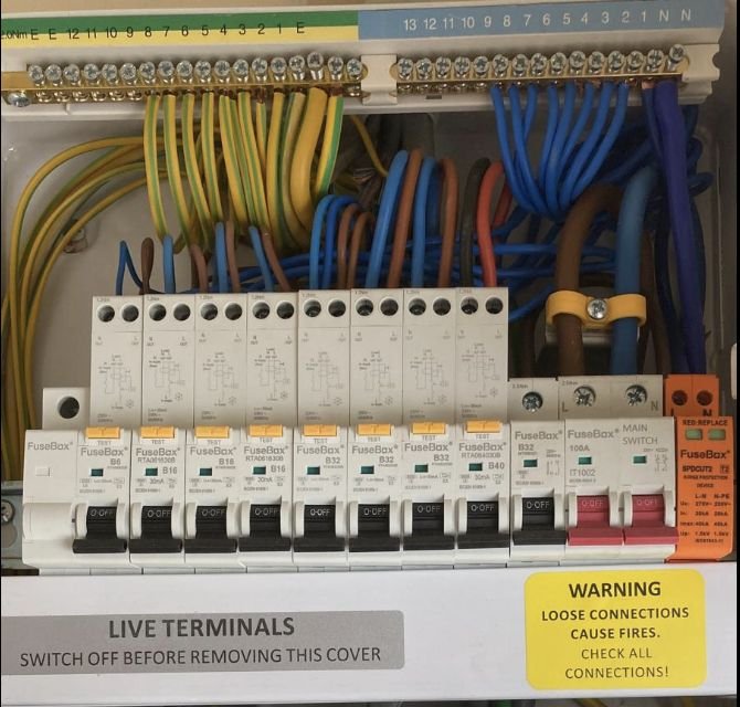 A consumer unit with a mix of circuit ratings, cover off